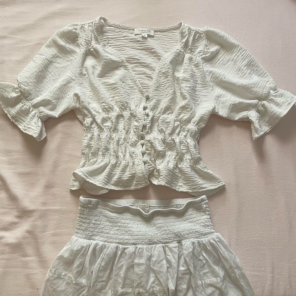 White ruffled babydoll blouse